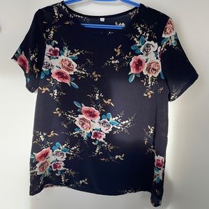 Floral short sleeved blouse.
